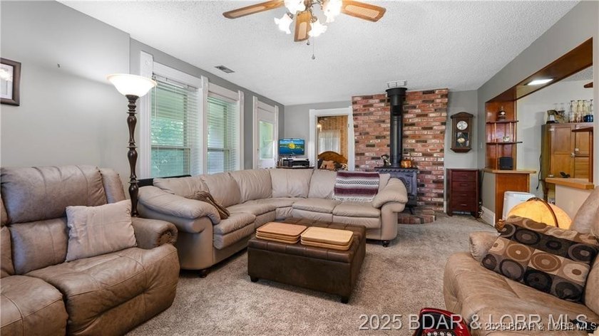 Own a piece of historic Old Linn Creek with this beautiful and - photo 9