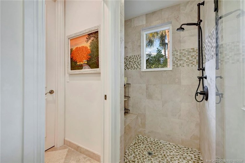 This elegant Sailfish Point estate is ideally positioned on the - photo 36