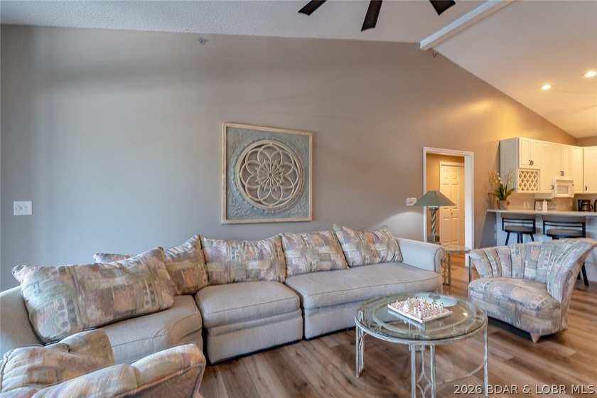 This top-floor Lazy Days condo shows like brand new and is being - photo 29