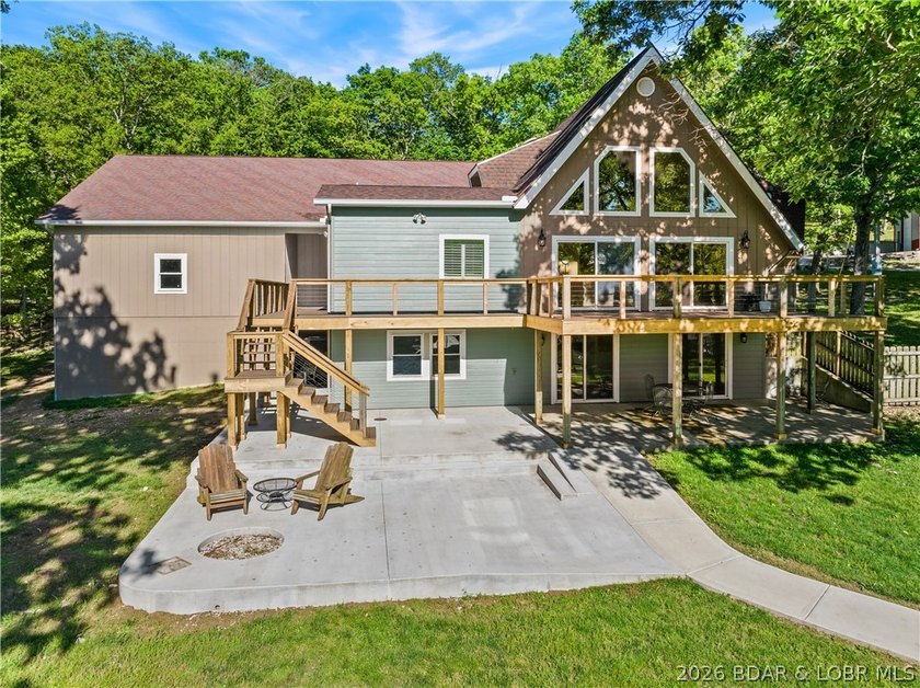 EXTREMELY MOTIVATED SELLER. Nearly flat lakefront yard, acreage - photo 3