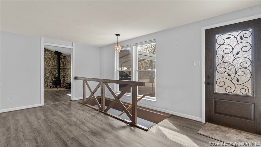 Welcome to this spacious 5-bedroom, 2-bath home in the Malibu - photo 6