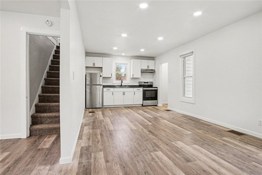 Turnkey investment opportunity or ideal owner-occupied duplex! - photo 9