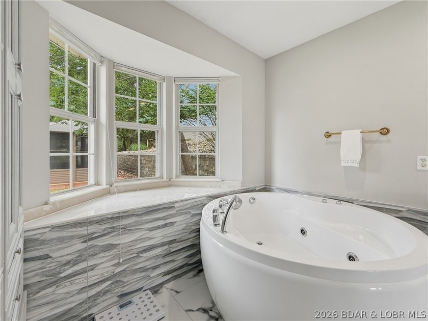Perched on a bluff in the heart of Osage Beach, this one-owner - photo 18