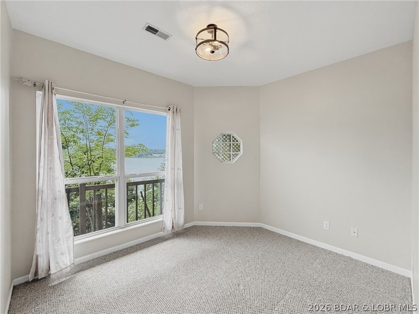 Perched on a bluff in the heart of Osage Beach, this one-owner - photo 30