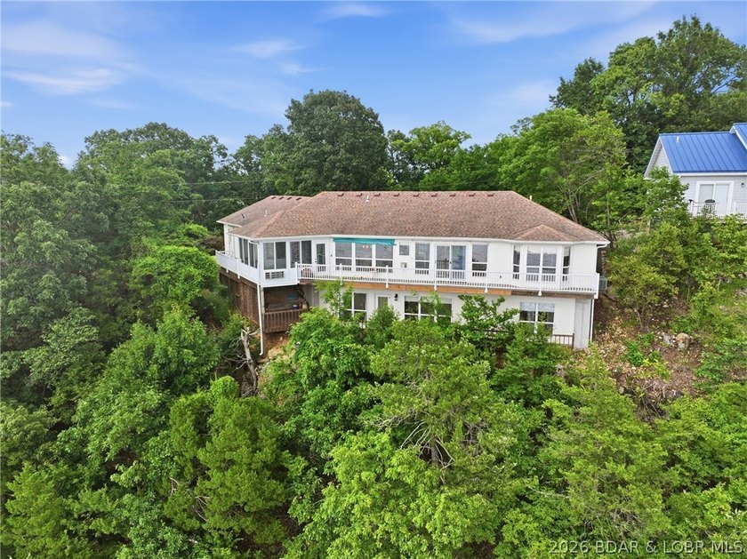 Perched on a bluff in the heart of Osage Beach, this one-owner - photo 35