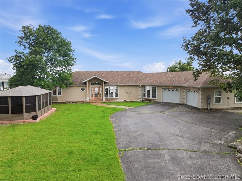 Perched on a bluff in the heart of Osage Beach, this one-owner - photo 37