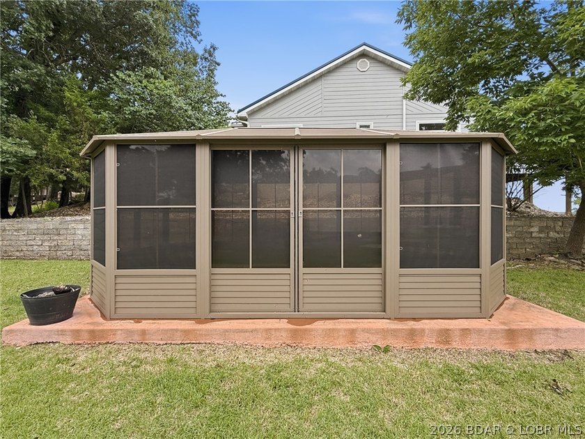 Perched on a bluff in the heart of Osage Beach, this one-owner - photo 43