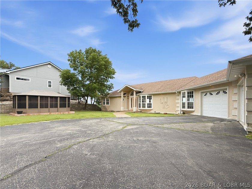 Perched on a bluff in the heart of Osage Beach, this one-owner - photo 44