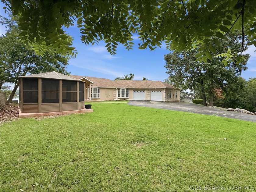 Perched on a bluff in the heart of Osage Beach, this one-owner - photo 45