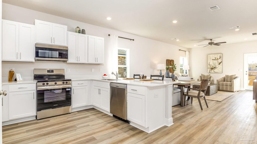 Welcome to Waterside at East Bay! Brand NEW community featuring - photo 4