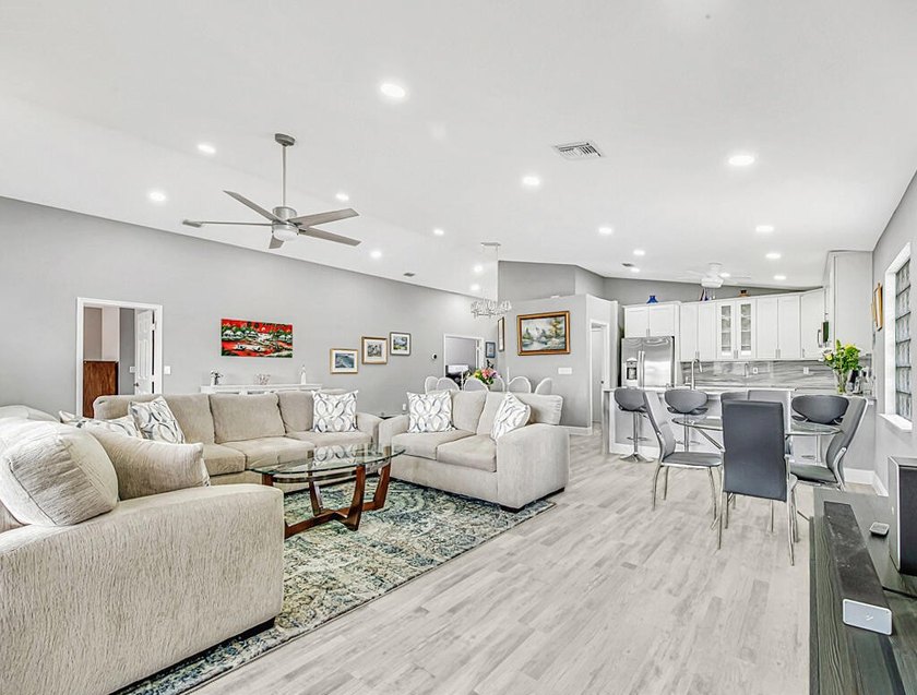 ENORMOUS GREAT ROOM! ONE OF A KIND OPEN FLOOR PLAN! LIKE NEW! - photo 11