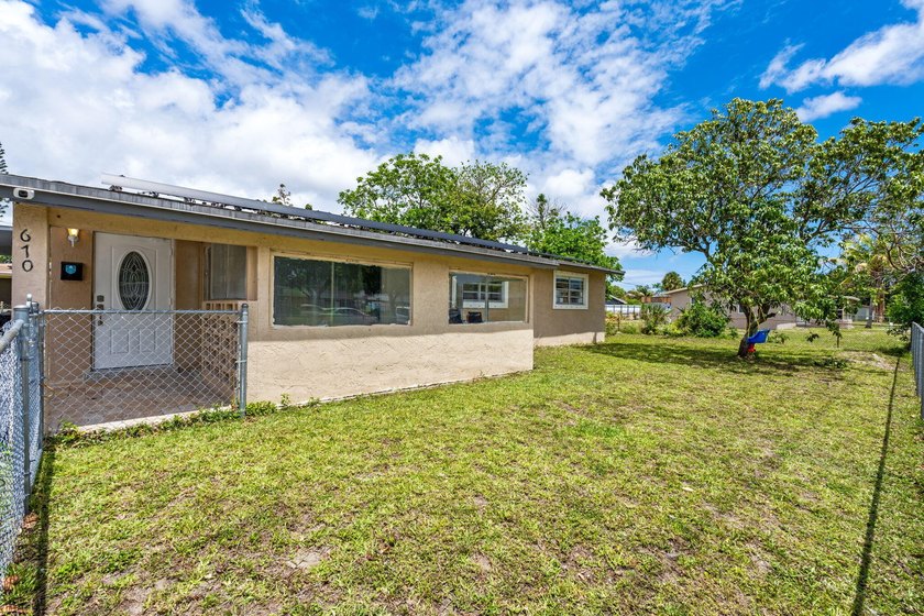 Discover this beautifully maintained 4-bedroom, 2-bathroom - photo 29