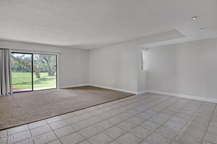RIVERFRONT LIVING AT ITS FINEST! This stunning ground floor - photo 9