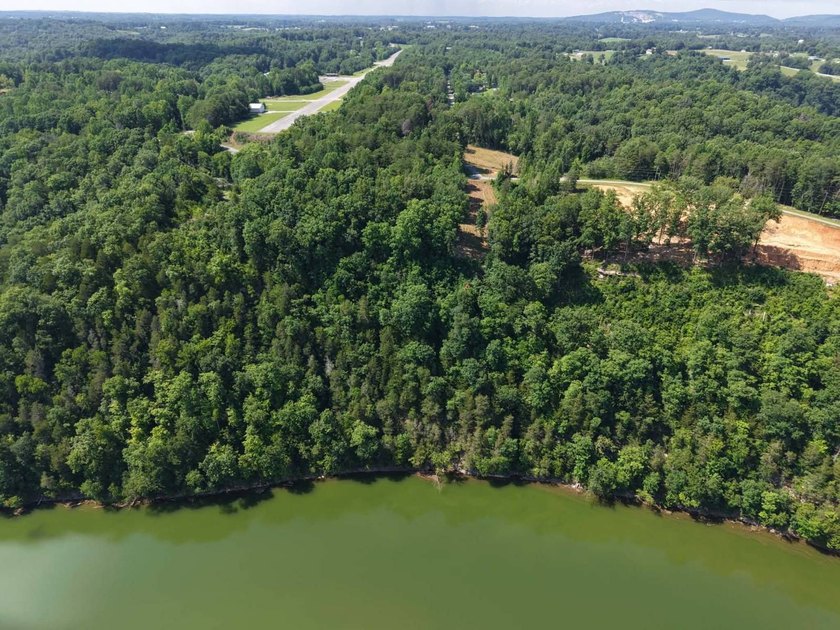 Don't miss this beautiful 0.69+/- acre lakeview lot overlooking - photo 3