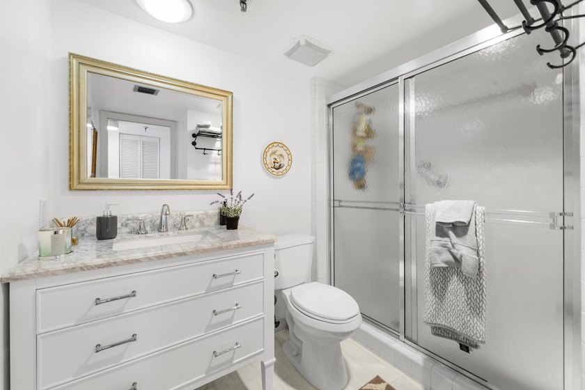 Welcome to this exceptional garden apartment, a rare find with - photo 19