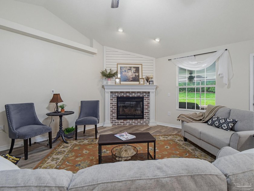 Property is located in the beautiful, tree-lined community of - photo 9
