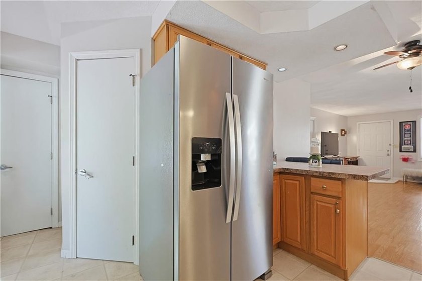 Enjoy the ease of one-level living in this desirable end-unit - photo 13