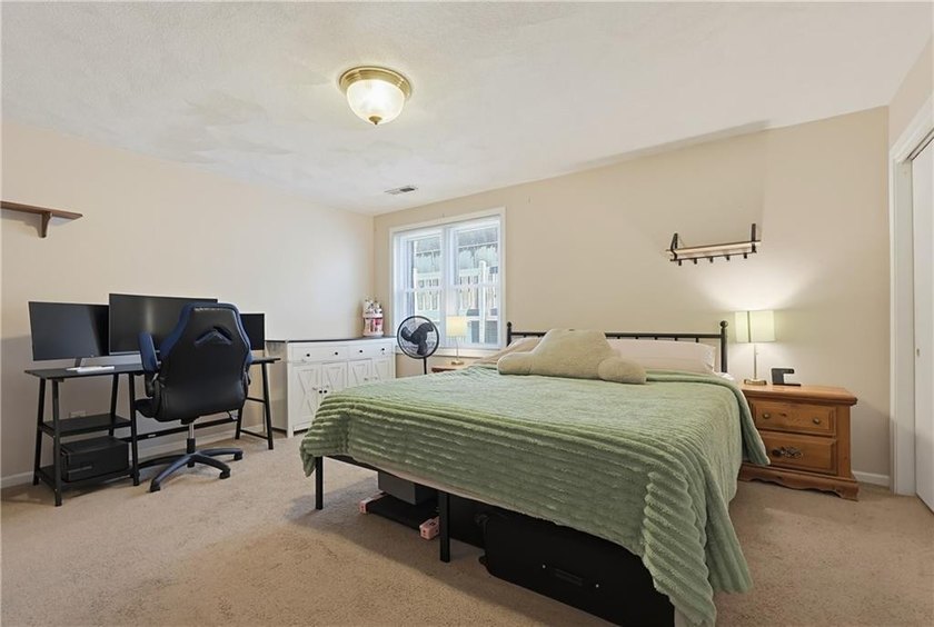 Enjoy the ease of one-level living in this desirable end-unit - photo 18