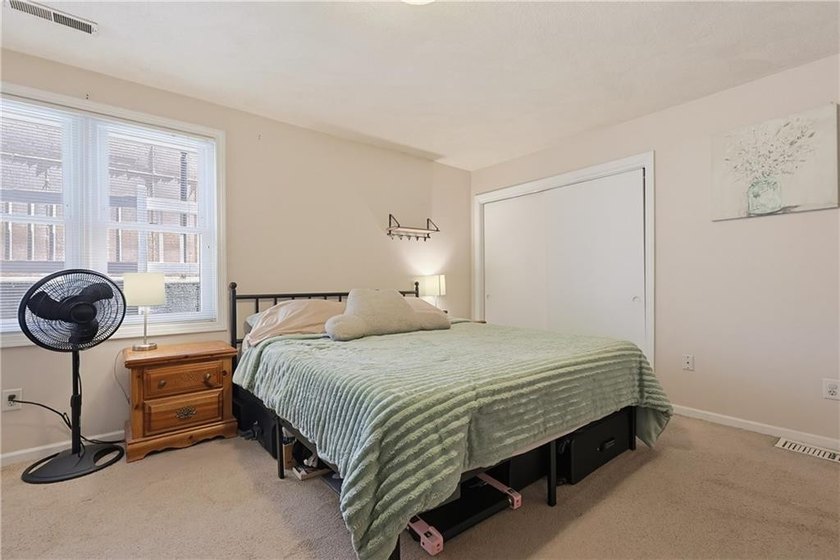 Enjoy the ease of one-level living in this desirable end-unit - photo 19
