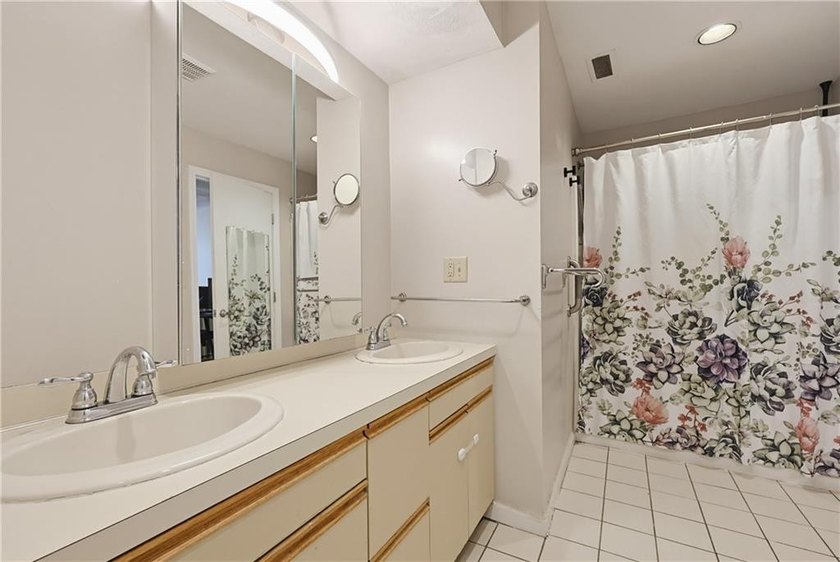 Enjoy the ease of one-level living in this desirable end-unit - photo 26