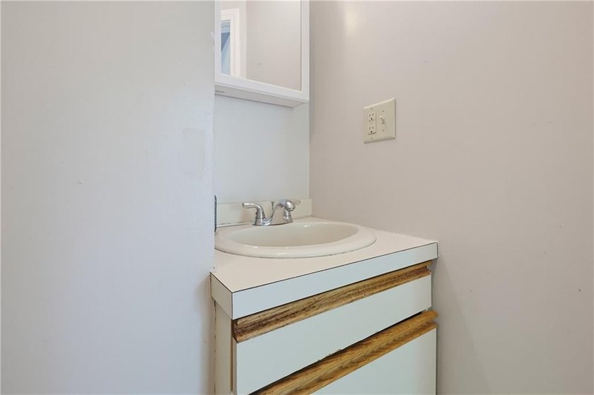 Enjoy the ease of one-level living in this desirable end-unit - photo 27