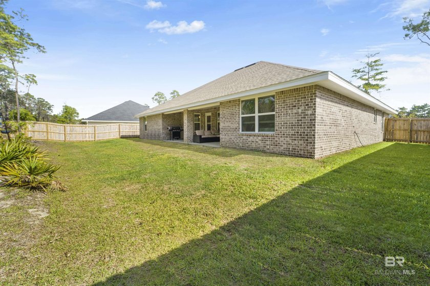 Welcome to this beautifully designed 4-bedroom, 3-bath brick - photo 28