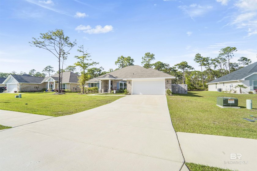 Welcome to this beautifully designed 4-bedroom, 3-bath brick - photo 34