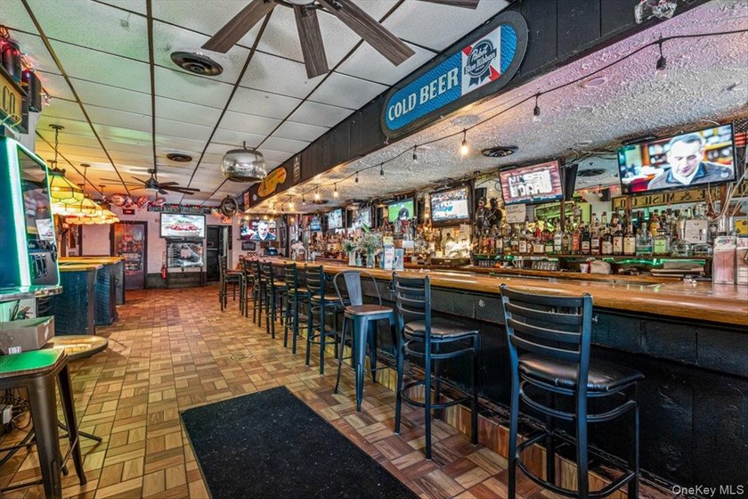 Welcome to The Dart Inn, a beloved neighborhood sports bar in - photo 13