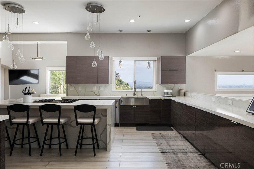 Perched in the hills of Panorama Heights in North Tustin, this - photo 13