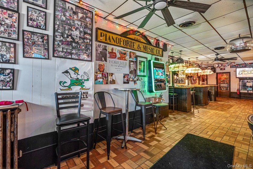 Welcome to The Dart Inn, a beloved neighborhood sports bar in - photo 14