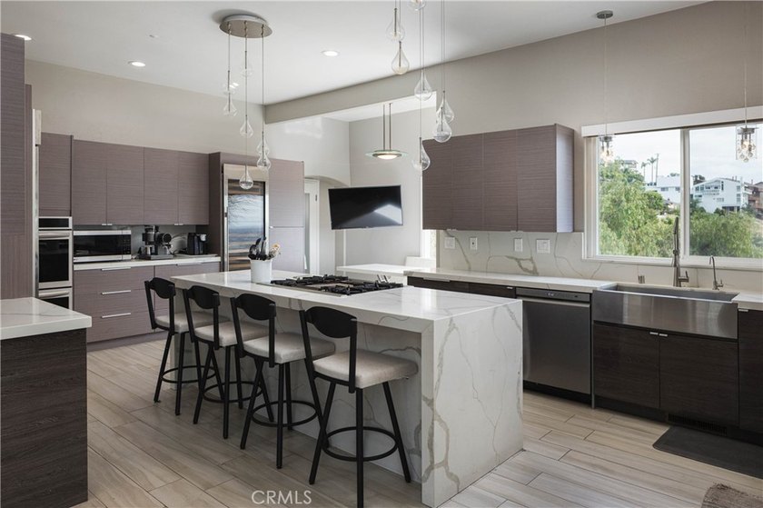Perched in the hills of Panorama Heights in North Tustin, this - photo 14