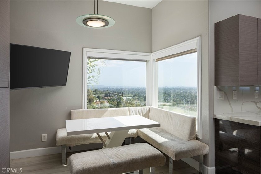 Perched in the hills of Panorama Heights in North Tustin, this - photo 17