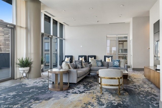 Walls of windows beautifully frame breathtaking views of Lake - photo 23