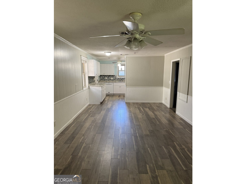 This beautiful, renovated duplex is located approximately 4 - photo 2