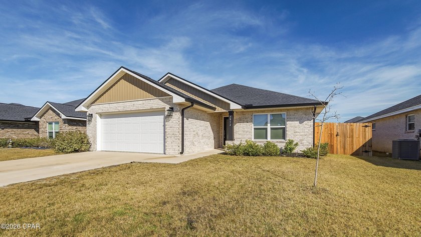 Move-in ready and packed with upgrades, this solid brick home - photo 3