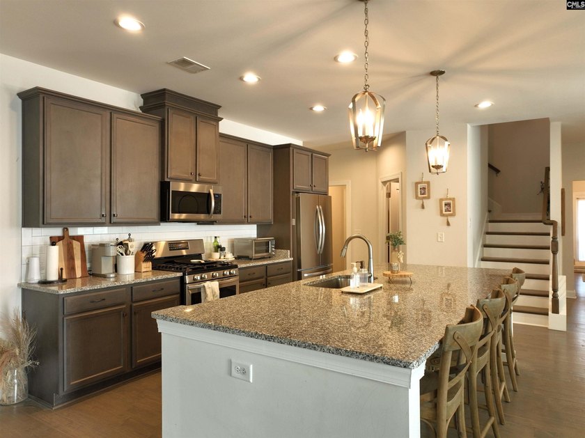 Welcome home to this beautiful all-brick ranch located in the - photo 13