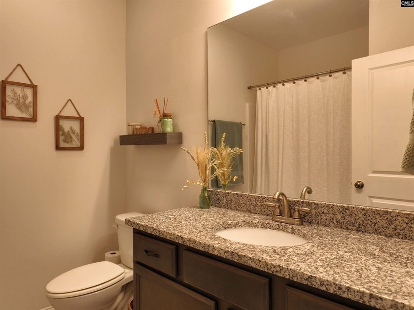 Welcome home to this beautiful all-brick ranch located in the - photo 32