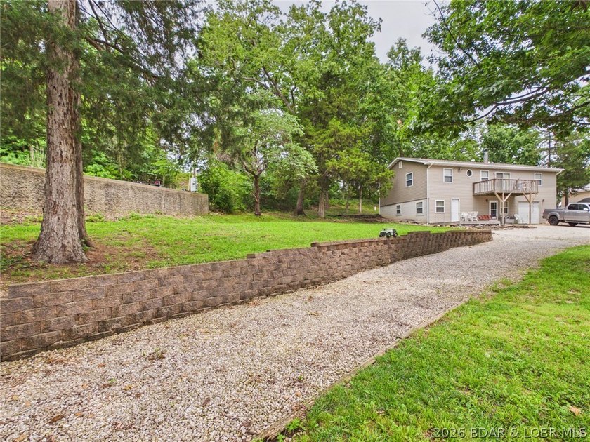 Don't miss this exceptional 4-bedroom, 2-bath lakefront home - photo 12