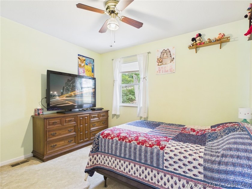 Don't miss this exceptional 4-bedroom, 2-bath lakefront home - photo 33