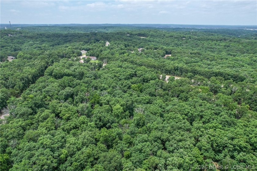 1.62-acre wooded lot in the sought-after Four Seasons community - photo 22