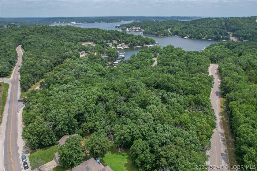 1.62-acre wooded lot in the sought-after Four Seasons community - photo 25