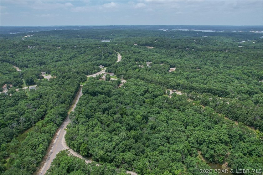 1.62-acre wooded lot in the sought-after Four Seasons community - photo 27