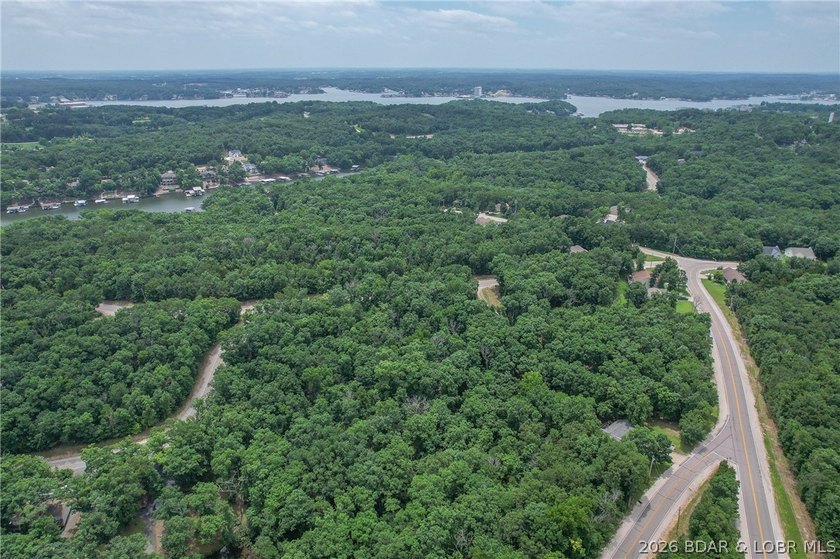 1.62-acre wooded lot in the sought-after Four Seasons community - photo 29