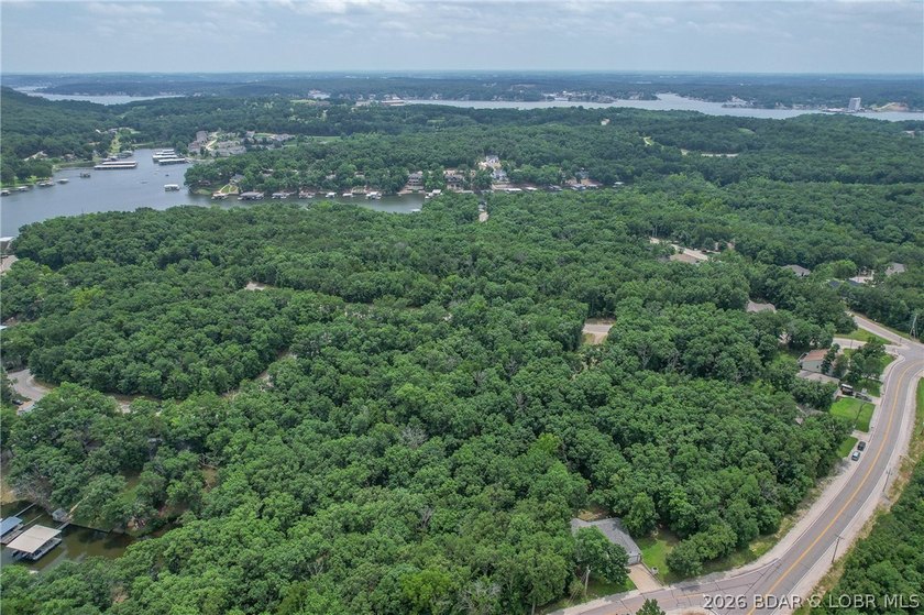 1.62-acre wooded lot in the sought-after Four Seasons community - photo 30