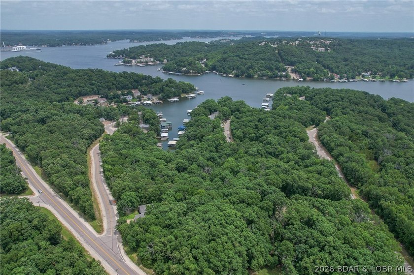 1.62-acre wooded lot in the sought-after Four Seasons community - photo 32