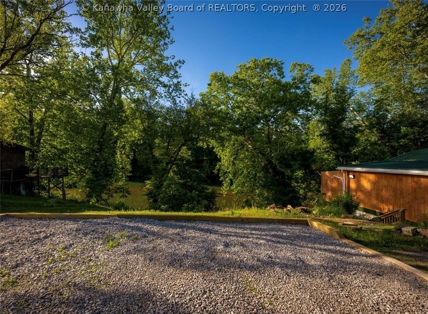 River life meets everyday comfort in this charming home nestled - photo 3