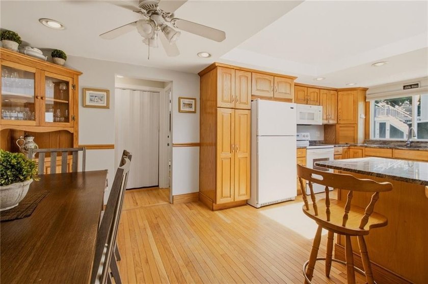 Tucked away on a quiet street and backing directly onto the open - photo 11