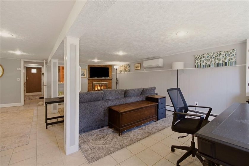 Tucked away on a quiet street and backing directly onto the open - photo 25