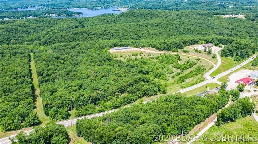 Prime highway front acreage ready for building a new commercial - photo 7