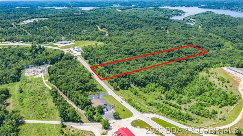 Prime highway front acreage ready for building a new commercial - photo 9